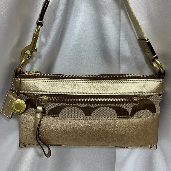 Coach Handbags - Coach small wrist/elbow  bag with signature print  18-H4c